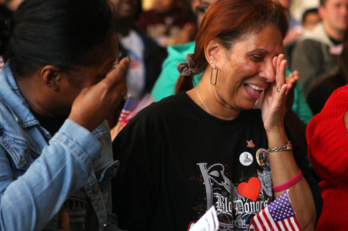 Bookstore employees wipe away tears immediately following the swearing-in ceremony of President Obama. Emotions ran high in the St. Charles Room throughout the inaugural coverage.