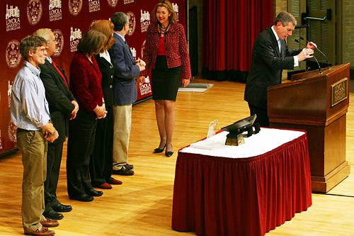 Dian Tooley-Knoblett, professor of law, walks onto stage along side colleagues to accept her 25 year Service Award during the Presidents Convocation in Nunemaker Hall Jan. 23. (Photo by Tom Macom/The Maroon)