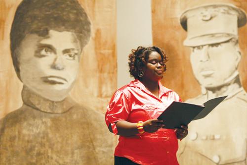 Music education sophomore Jasmine Blue sings at the Portraits of Courage event on Feb. 17. The event showcased African American struggles and victories throughout history. 