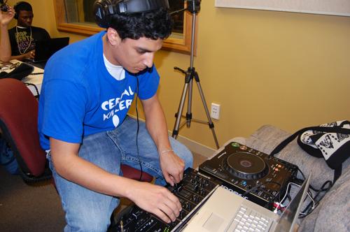 Co-host of Loyola radio show, Ritmo Latino, Mikey Paz and Victor Harewood spin music. The show began this semester.