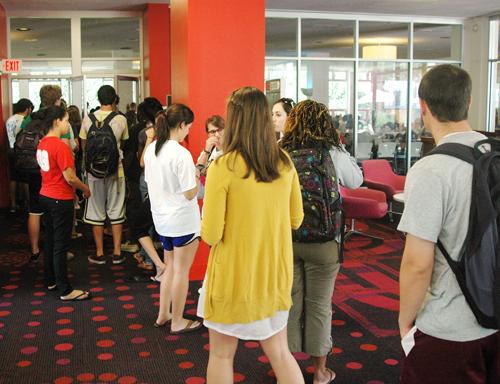 Hungry students wait in line for lunch outside the Orleans Room Wednesday Sept. 2. Under the new OR To Go policy, students with a meal plan will be able to take their lunch to go. 