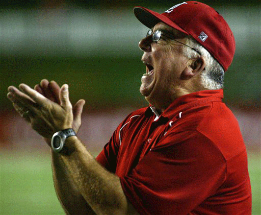 Louisiana-Lafayette head coach Rickey Bustle encourages his players from the sideline in an NCAA college football game against Kansas State on Saturday, Sept. 12, 2009 at Cajun Field in Lafayette, La. 