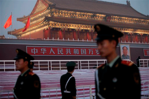 Chinese paramilitary police guard the area that leads to Tiananmen Gate in Beijing Wednesday, Sept. 30, 2009. Downtown Beijing was virtually closed Wednesday, with police blocking off Tiananmen Square, the Forbidden City and other popular tourist landmarks in preparation for an extravaganza to mark 60 years of communist rule that is expected to rival the Olympic opening ceremony.
