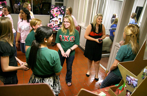 Members of Alpha Chi Omega, foreground, and Gamma Phi Beta sororities take part in Hanging With the Greeks, an event to introduce prospective recruits to Loyolas four sorority chapters, in Buddig Hall Wednesday, Sept. 23.