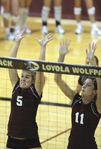 Freshmen Rachael Roth and Samantha Worsham play tough defense against Millsaps College on Sept. 29.