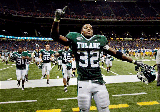 Tulane running back Andre Anderson celebrates toward the fans for their support after the Green Wave beat McNeese State 42-32 in an NCAA college football game at the Louisiana Superdome on Saturday, Sept. 26, 2009 in New Orleans. 
