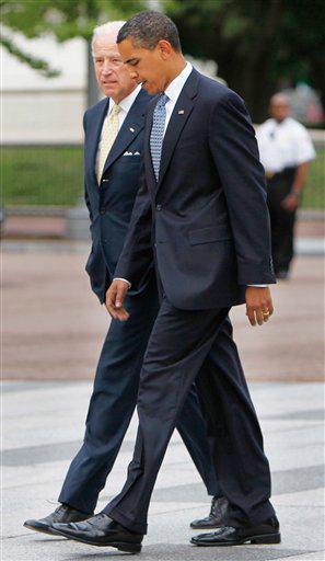 FILE - President Barack Obama, right, and Vice President Joe Biden, left, walk out of the White House and across Pennsylvania Ave. to the Blair House in Washington. 