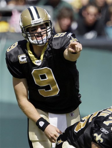 ** ADVANCE FOR WEEKEND EDITIONS, OCT. 17-18 ** In this photo taken on Sept. 20, 2009, New Orleans Saints quarterback Drew Brees gestures from the line during an NFL football game against the Philadelphia Eagles in Philadelphia. At 5-0, the New York Giants match the best record in the NFL. Unlike the Colts, Broncos and Vikings, they've hardly played anyone worth mentioning. That in-season vacation ends Sunday at New Orleans. 