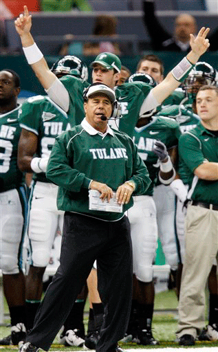Tulane football coach Bob Toledo, front, watches a field goal attempt as Tulane quarterback Ryan Griffin (11) signals the kick is good in the first half against Houston in an NCAA college football game in the in New Orleans, Saturday, Oct. 17, 2009. 