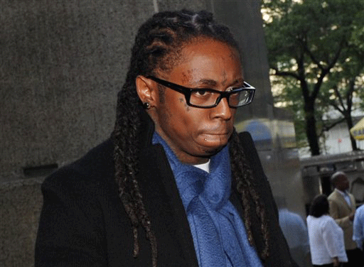 Rapper Lil Wayne enters Manhattan criminal court, Wednesday, Oct. 21, 2009, in New York. A hearing on a DNA profiling technique used in the rappers 2007 gun-possession case was due to start Wednesday. 