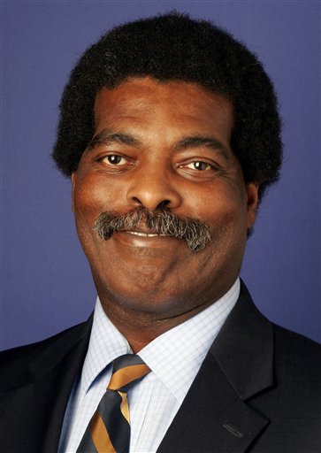 In this June 6, 2006 photo, Mike McQueen, chief of bureau for The Associated Press in Louisiana and Mississippi, poses in New Orleans. McQueen, who had been on medical leave since the spring, died Sunday, Oct. 25, 2009. He was 52