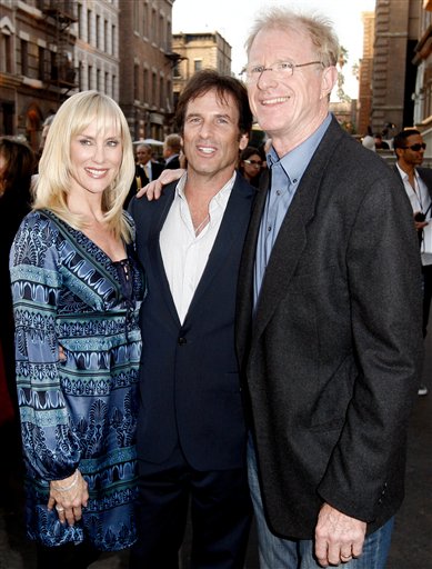 Actors Hart Bochner, center, and Ed Begley, Jr., right, with his wife Rachelle Carson, arrive at the 20th Anniversary Environmental Media Awards at the Paramount lot on Sunday, Oct. 25, 2009, in Los Angeles.
