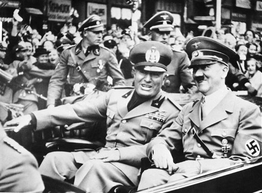 FILE - File photo dated Sept. 28, 1938 showing Italian dictator Benito Mussolini, at left in foreground, and Nazi leader Adolf Hitler, at right, taken just before the four power conference in Munich, Germany. As a gesture of friendship, Hitler met Mussolini with his car at the Italo-German frontier. Benito Mussolini was a fierce anti-Semite, who proudly said that his hatred for Jews preceded Adolf Hitlers and vowed to destroy them all, according to previously unpublished diaries by the Fascis