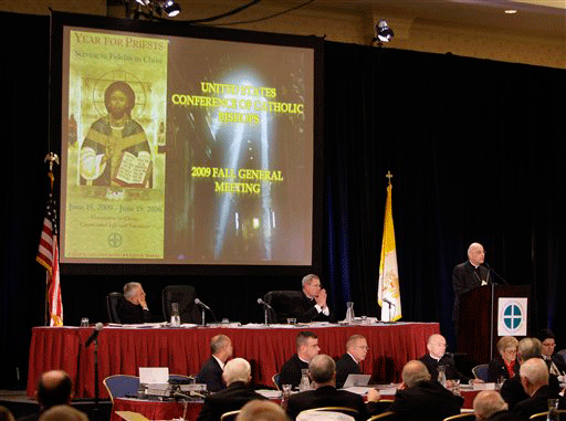 Chicago Cardinal Francis George, far right, the president of the U.S. Conference of Catholic Bishops, addresses the group's fall meeting Monday, Nov. 16, 2009, Baltimore.