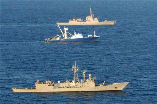 In this photo released by the Spanish defence ministry Wednesday Nov. 18, 2009, the Spanish trawler Alakrana is seen at centre, escorted by two Spanish frigates in a photo taken Tuesday Nov. 17, 2009, off Somalia. Somali pirates freed the Spanish trawler Tuesday with crew of 36 after holding them hostage for more than six weeks. Spain's Premier Jose Luis Rodriguez Zapatero did not say if a ransom was paid for the release of the tuna boat Alakrana. 