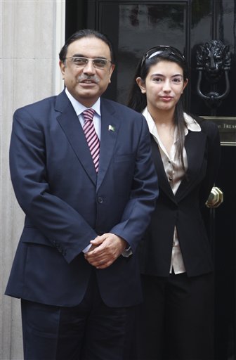 FILE - In this Friday, Aug. 28, 2009 file photo, Pakistan's President Asif Ali Zadari, left, and his daughter Asifa Bhutto Zadari, right, pose for the photographers in London,
