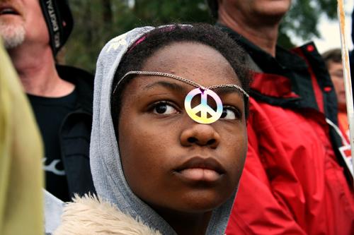 A girl looks on at an event at the Schools of the Americas Watch protest in Fort Benning, Ga., Sunday Nov. 22. Loyola students attended the protest of the alleged actions of graduates of the School of the Americas, including the massacre of six Jesuit priests in El Salvador.