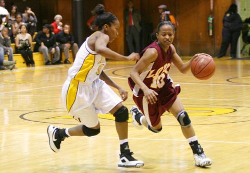 Trenell Smith, manegement senior, attempts to drive by a defender.