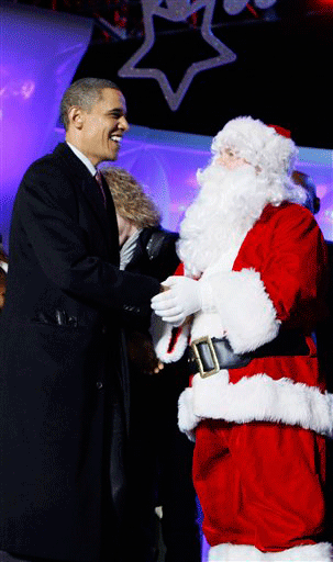 President Barack Obama greets Santa Claus played by Brad Oscar at the National Christmas Tree Lighting Ceremony in Washington, Thursday, Dec. 3, 2009.