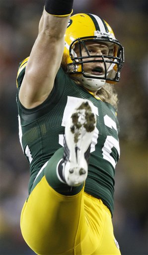 Green Bay Packers' Clay Matthews reacts after sacking Baltimore Ravens' Joe Flacco during the first half of an NFL football game Monday, Dec. 7, 2009, in Green Bay, Wis.