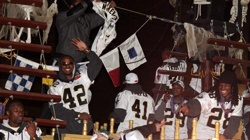 Javari Greer (left), Darren Sharper (center) and Usama Young (right) were only some of the Saints players who rode in the New Orleans Saints’ Super Bowl victory parade Tuesday, Feb. 9.