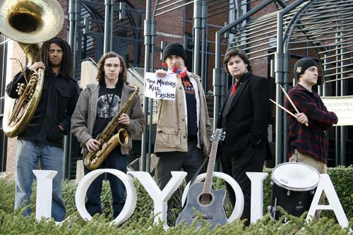 From left, Jimmy Williams, Wayne Mitchell, Noah Adams, Charlie Skinner and Dane “Bootsy” Schindler, together as the Dirty Bourbon River Show, pose outside the Communications/Music Complex Tuesday, Feb. 23