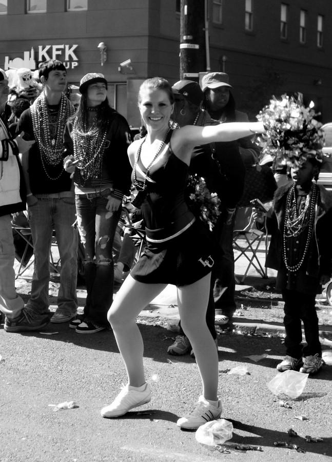 Kayla Cox, criminal justice junior, struts her stuff in Thoth parade on Saturday Feb. 13th. Thedance team marched in several parades this carnival season.