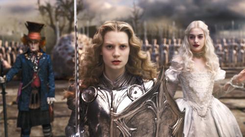 In this fi lm publicity image released by Disney, Johnny Depp, left, Mia Wasikowska, center, and Anne Hathaway are shown in a scene from the fi lm, “Alice in Wonderland.”