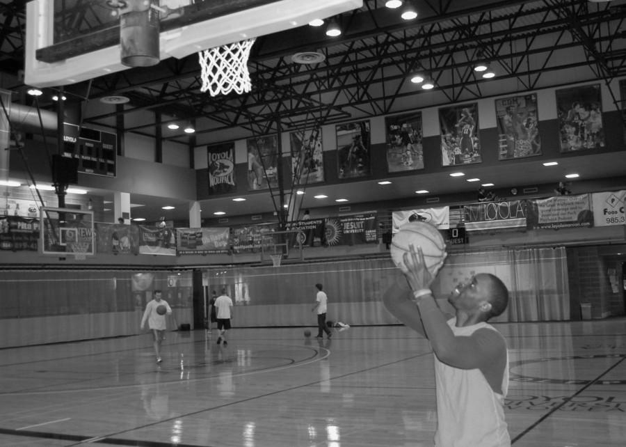 Emmanuel Musa, Loyola Law student, practices his layup. Intramural teams often use the Rec Plex to practice for games.