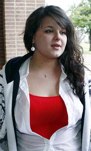 ILE - In this March 22, 2010 file photo, Constance McMillen, an 18-year-old senior at Itawamba County Agricultural High School, speaks to reporters outside the federal courthouse in Aberdeen, Miss., following a hearing regarding the ACLU's preliminary injunction to force the prom at her high school after being informed she could not wear a tux or have a same-sex date. McMillen's senior prom was far short of the rite of passage she hoped to experience when she began the legal battle. Millen says 
