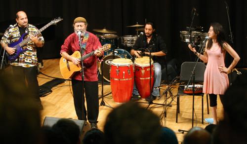 Calypso musician Manuel Monestel plays an acoustic guitar set with his band mates, Marvin Brenes on bass and Rafael Vargas on drums, Wednesday April 14th in Nunemaker Auditorium. They introduced the audience to Costa Rican Calypso music in an event celebrating the opening of the Center for Latin American and Caribbean Studies at Loyola.