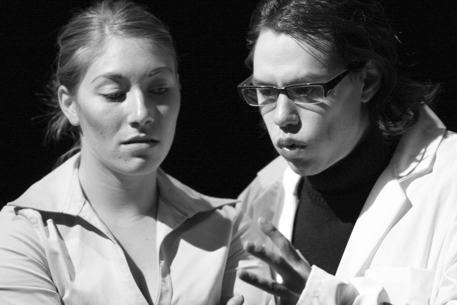 Theatre arts senior Adrienne Burns, left, plays the role of Dorothy, a scientist and wife of Gray, who is played by junior Tyler Yee, right, in a dress rehearsal performance of "Eternity in the Hearts of Man," written by Dan Schap, A'08, and directed by Rebbecca Hollingsworth.
