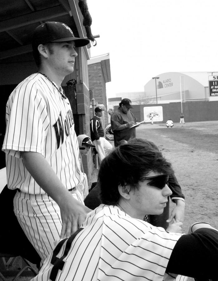 Junior marketing major, Lucas Wendt, watches the Wolfpack from the dugout. After a hot streak in the GCAC tournament, the team finally fell to LSU-Shreveport in the championship.