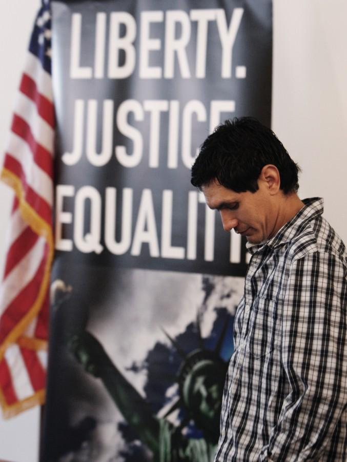 Hugo Alcantar Fernandez, a plaintiff, stands by as the American Civil Liberties Union and other groups announced a federal lawsuit against Terra Universal Inc., of Fullerton, Calif.