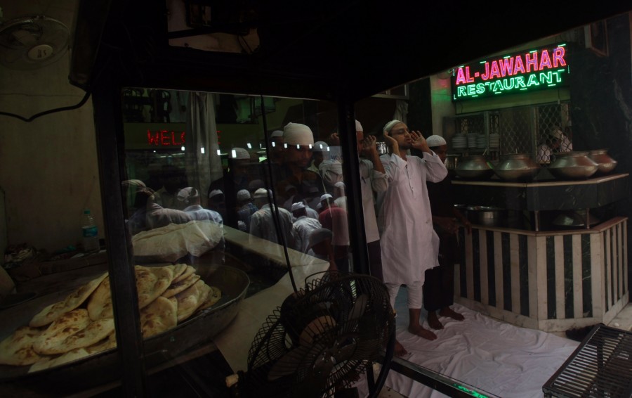 Muslims offer Friday prayers outside the Jama Masjid mosque in New Delhi, India, Friday, Sept. 3, 2010. Muslims throughout the world are marking the month of Ramadan, the holiest month in Islamic calendar where devout fast from dawn till dusk.