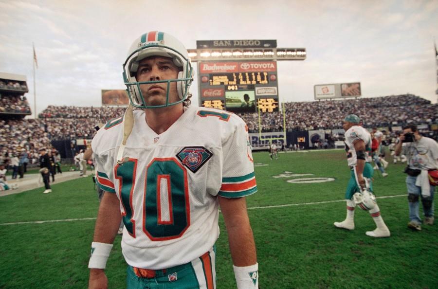 FILE - In this Jan. 8, 1995, file photo Miami Dolphins kicker Pete Stoyanovich walks off the field after the Dolphins 22-21 loss to the San Diego Chargers in an NFL football playoff game in San Diego. Stoyanovich had a chance to kick a 48-yard field goal with 6 seconds left to win the game but missed. Call it a Super Bowl jinx or call it a fluke. The bottom line is the same