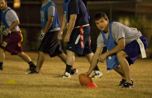 Sloppy Roastbeef Eaters’ center, Adam Jeanfreu, Loyola alum, prepares to hike the ball during a game Wednesday. Sloppy Roastbeef Eaters’ won the game 33-6.