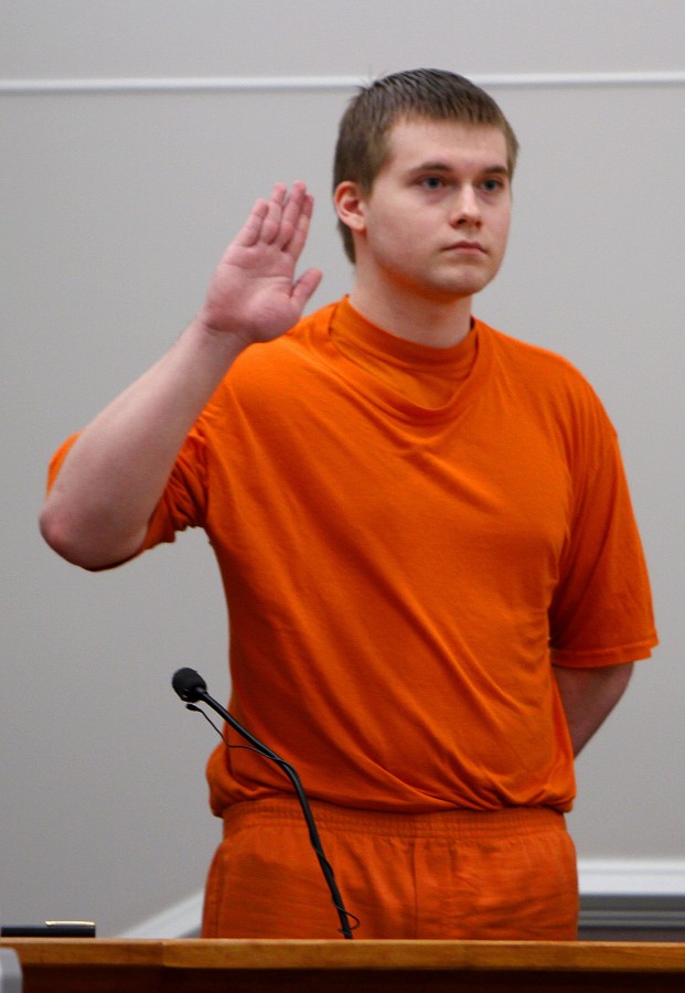 Quinn Glover takes the stand in Hillsborough County Superior Court in Nashua, N.H., Thursday, Oct. 28, 2010. Glover testified against Steven Spader, who is charged with murder, attempted murder and other felonies in the death of Kimberly Cates and the injuries to her now 12-year-old daughter, Jaimie. Glover has pleaded guilty to robbery, burglary and conspiracy. He agreed to cooperate with the state in exchange for a 20-year prison sentence. 