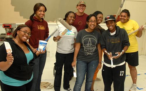 Loyola students Angelique Dyer, Jasmine Brown, Elleni Giorgis, Tanya Hamilton, Tracy Livingston, Briana Cheatham paint an office space. Wolves on the Prowl service day is Nov. 6.