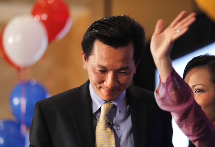 U.S. Congressman Anh "Joseph" Cao walks off the stage with his wife, Kate, after his defeat on election night Tuesday, November 2, 2010 at the New Orleans Marriott on Convention Center Blvd.