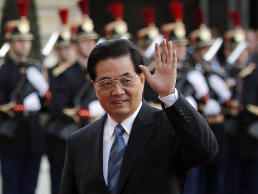 Chinese President Hu Jintao waves upon his arrival to meet French President Nicolas Sarkozy at the Elysee Palace in Paris, Thursday Nov. 4, 2010. The three-day state visit by Hu Jintao marks a dramatic turnaround from the tense ties of two years ago, when Sarkozy threatened to boycott the opening ceremony of the Beijing Olympics out of anger about China's treatment of Tibet.