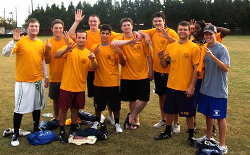 Team members of the Sloppy Roast Beef Eaters gather together for a picture after winning the championship game against the GoonSquad. The team holds a record of 41-0.