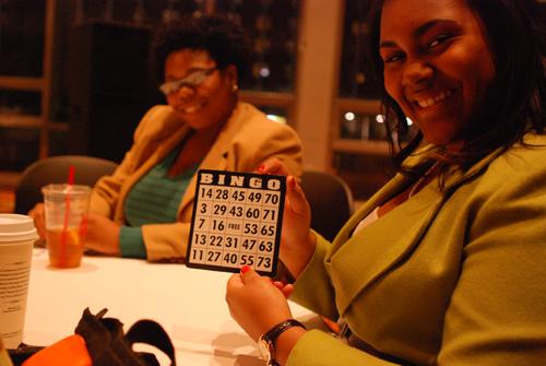 Students play the University Programming Board’s grocery bingo. Political science senior Tanya Hamilton, right, held her bingo card with Brianna Cheatham, international business junior.