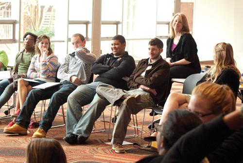 The resident assistants interact with a speaker on handling conflict. They met for their spring semester training Jan. 4.