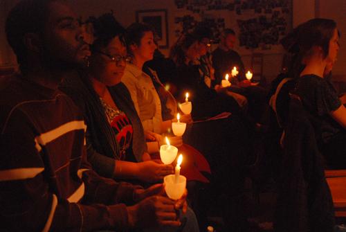 Students reflect at the Haiti prayer service in Ignatius Chapel.  The prayer service was held in memory of the first anniversary of the earthquake in Haiti on Jan. 12, 2010.