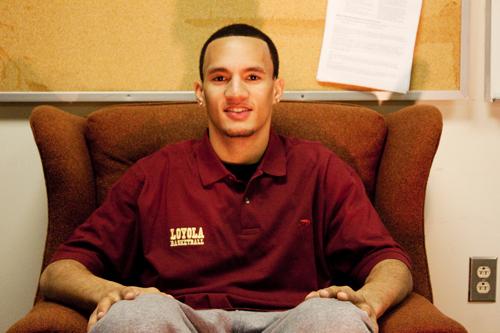 Ryan Brock, managment senior and basketball player, poses for a photo. Brock is the first athlete in Loyola’s history to be named NAIA All-American.