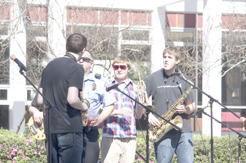 Loyola police officer, Mark Smutny, asks The Naughty Professors to get off stage at 2 p.m. The Battle of the Bands event ran over time and the last band did not get to play their full segment.