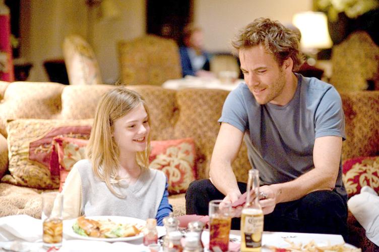 Elle Fanning, left, and Stephen Dorff star in Sofia Coppola’s “Somewhere.” The film was written and directed by Coppola.