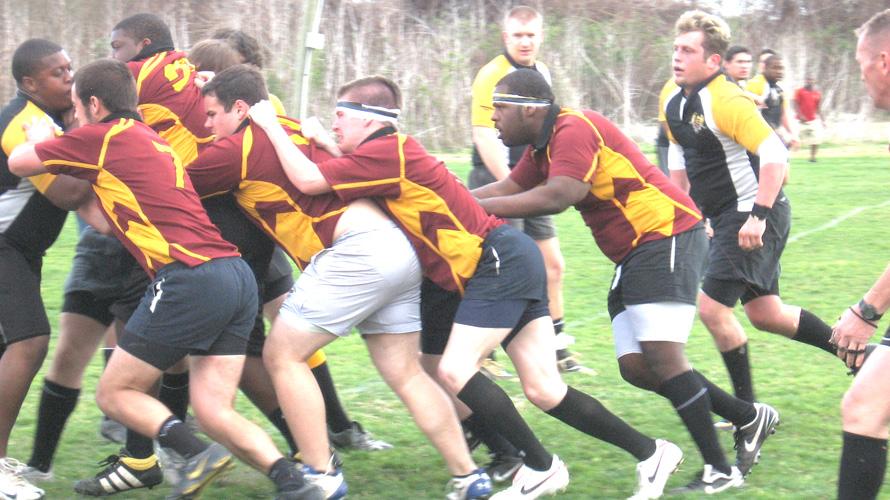 Members of the Loyola rugby team fight in a maul during a game against the University of Southern Mississippi.  They will play their first playoff game in six years on Saturday, March 26 in Pensacola, Fla.