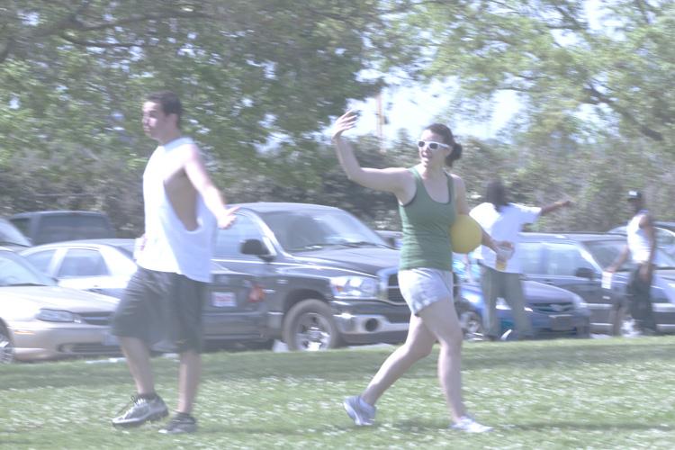 A Loyola law students settle a dispute during the Law school’s kickball tournament on March 26. The tournament was a fundraiser for earthquake relief in Japan.